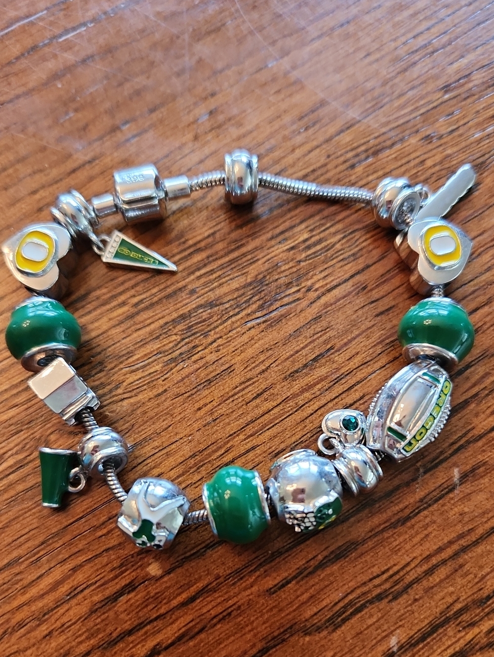 Silver Color Charm Bracelet with Green Beads and Sports Accents